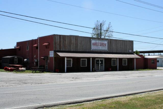 Exterior of a livestock sale barn in Springdale, Arkansas